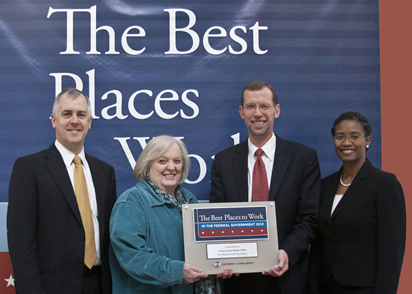 CBO staff accept award for agency’s ranking as one of the best places to work in the federal government